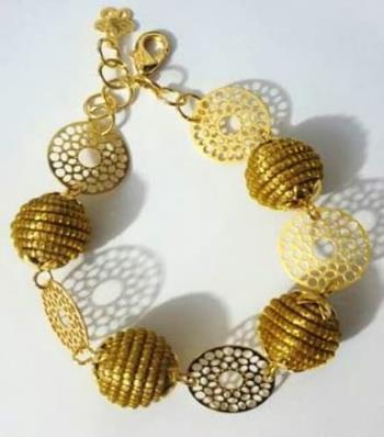 Pulseira orbes e metal